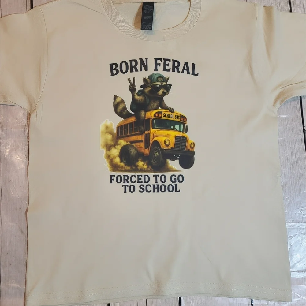 Kids Born Feral Graphic Tee with Raccoon and School Bus - cream
